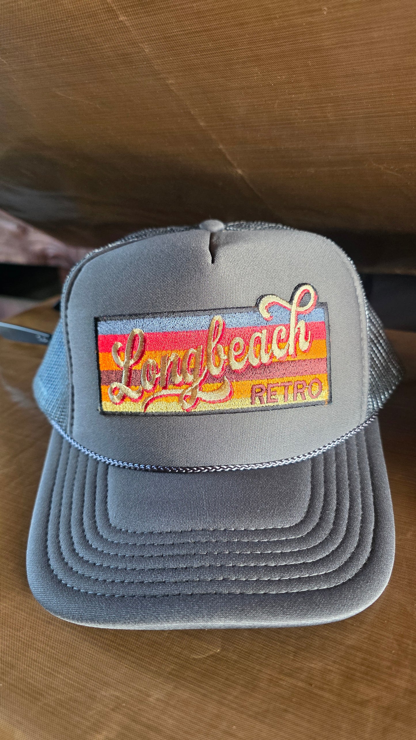 Gray snapback trucker hat