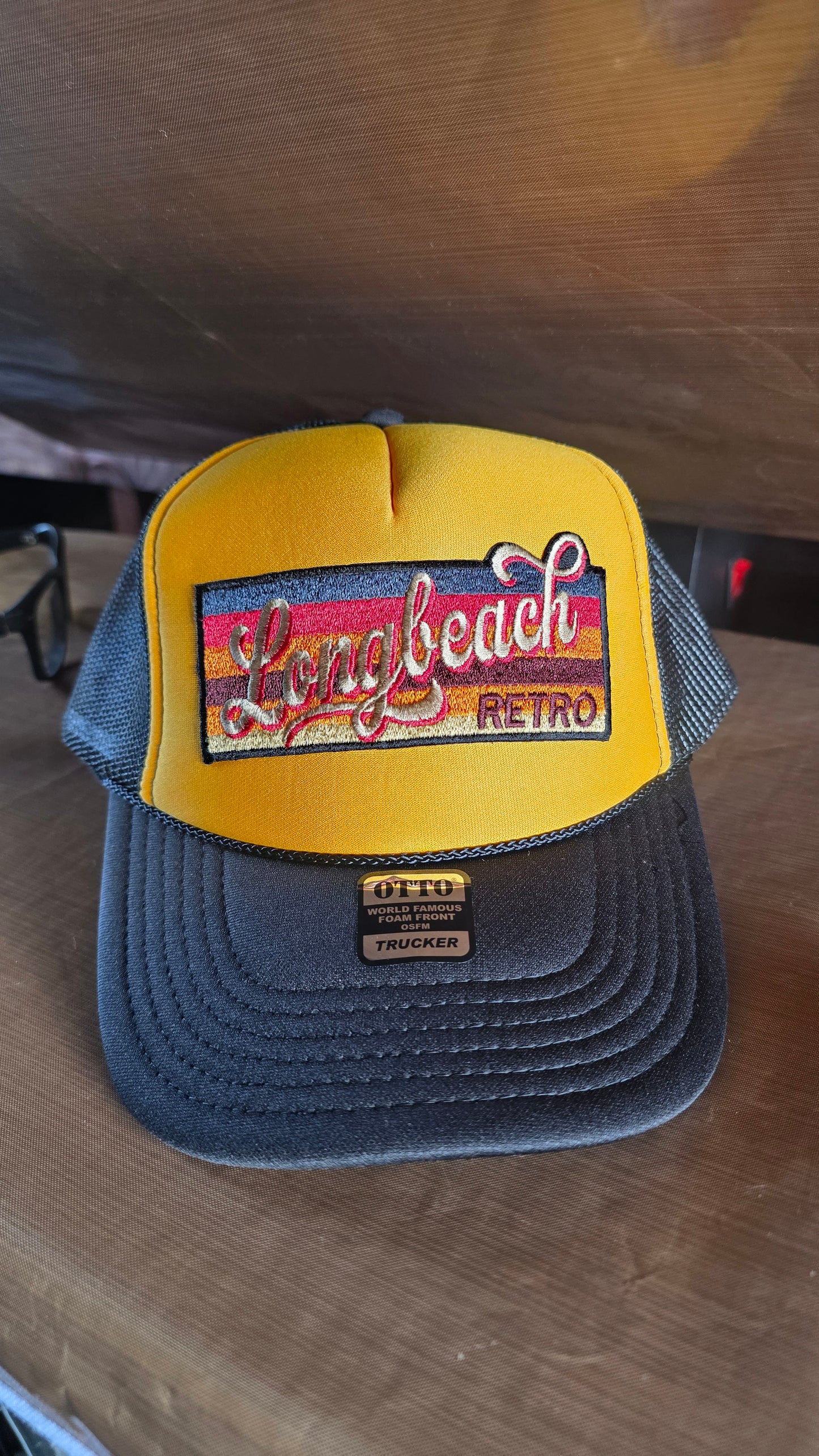 Black and yellow snapback trucker hat