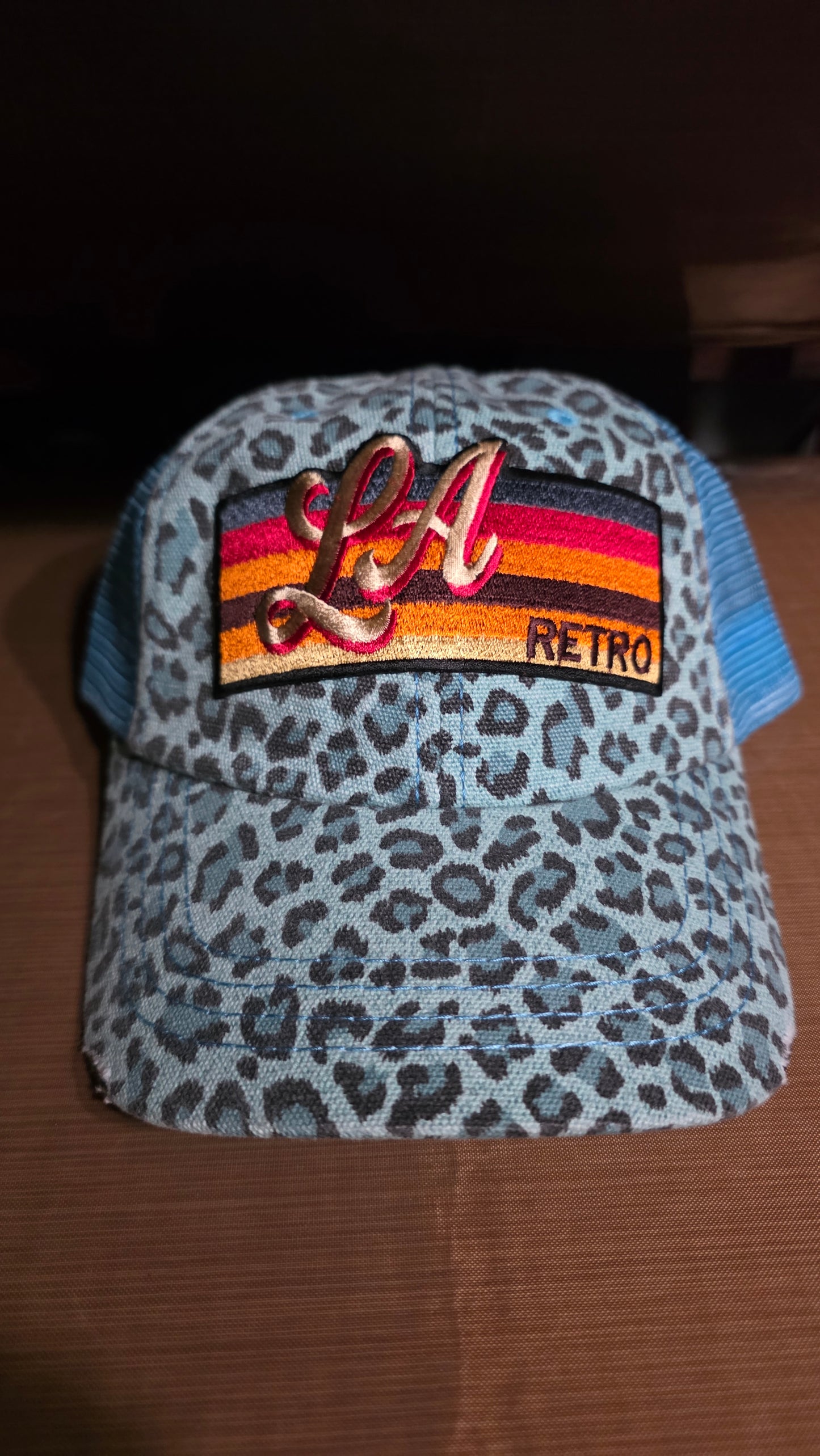 Light blue LA leopard trucker hat